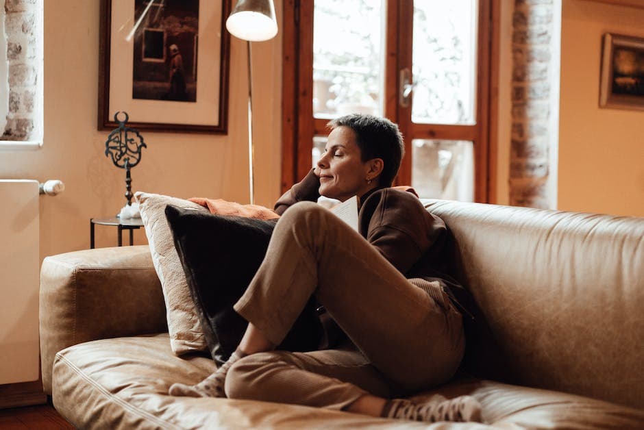 Short Haired Woman Sitting on Couch
