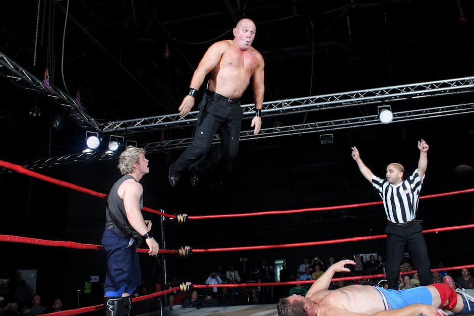 Photography of Man Jumping on Ring 