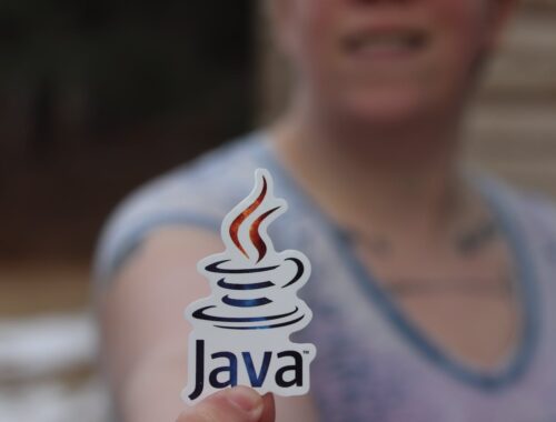 Smiling Man in Purple and White Tank Top with Java Logo keyholder
