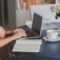 Person Using Black and Silver Laptop Computer
