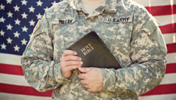 Man Holding Bible