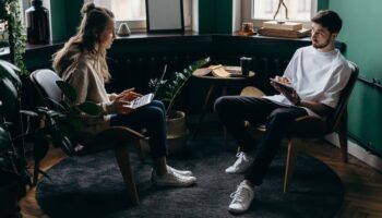 Photo of Man and Woman Talking to Each Other