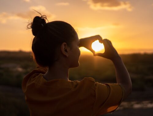 Woman Doing Hand Heart Sign