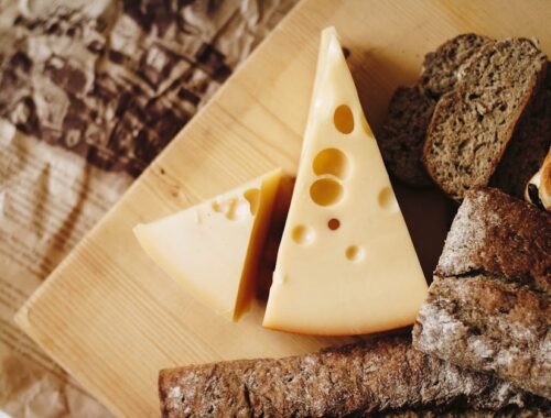 Sliced Cheese on Brown Table Top