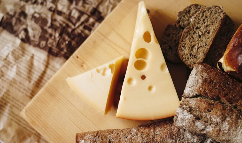 Sliced Cheese on Brown Table Top