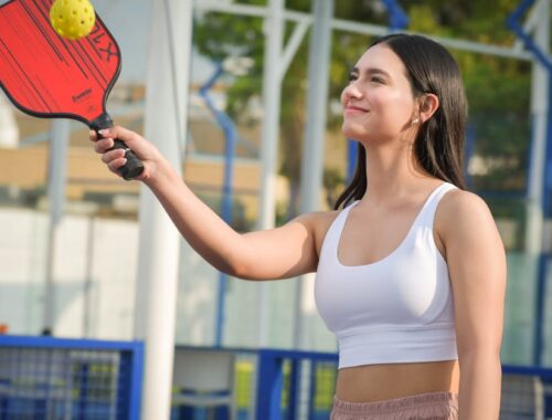 Woman with a Table Tennis Racket in her Hand